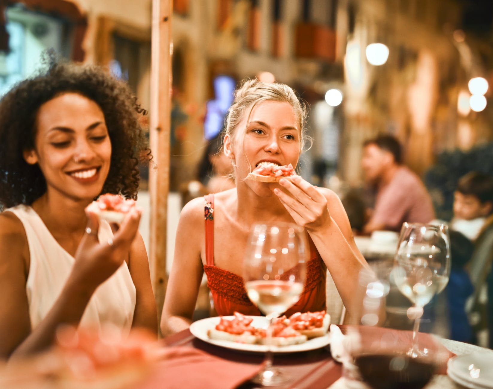 woman eating bruschetta, Food and Dining Near Samet Nangshe