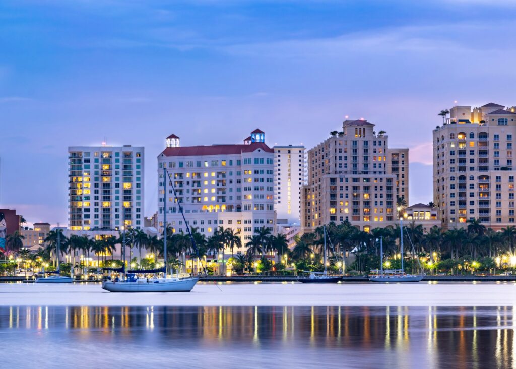 white boat docked on seashore - Palm Beach