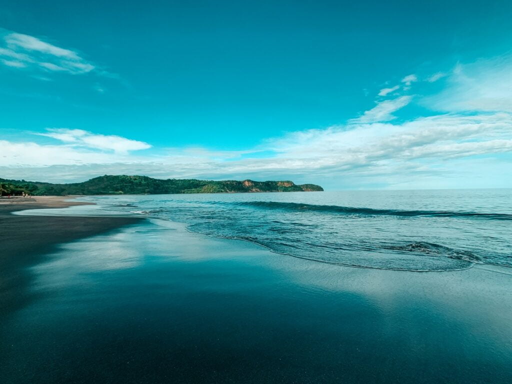 blue sea under blue sky during daytime