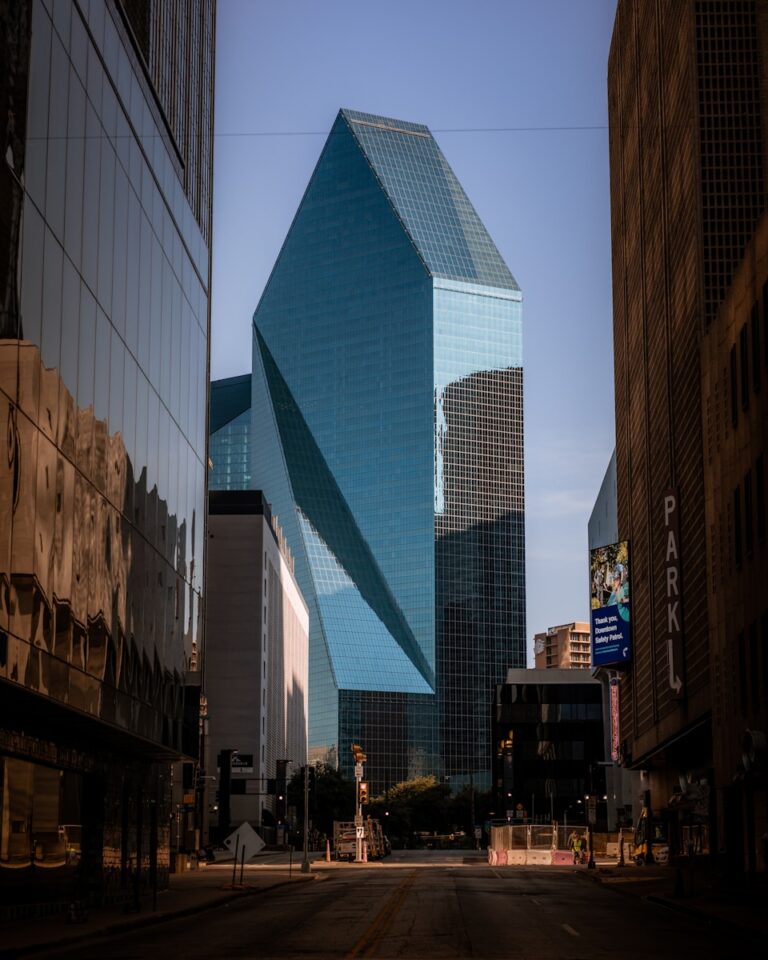 blue and white glass building - Dallas attractions