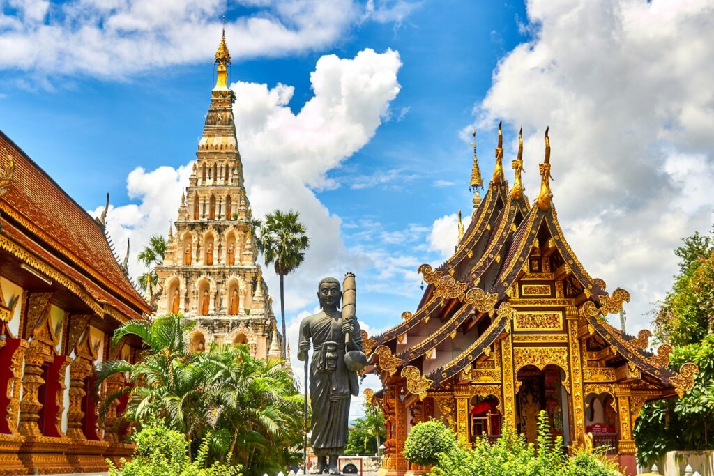 standing statue and temples landmark during daytime - Asia luxury resorts