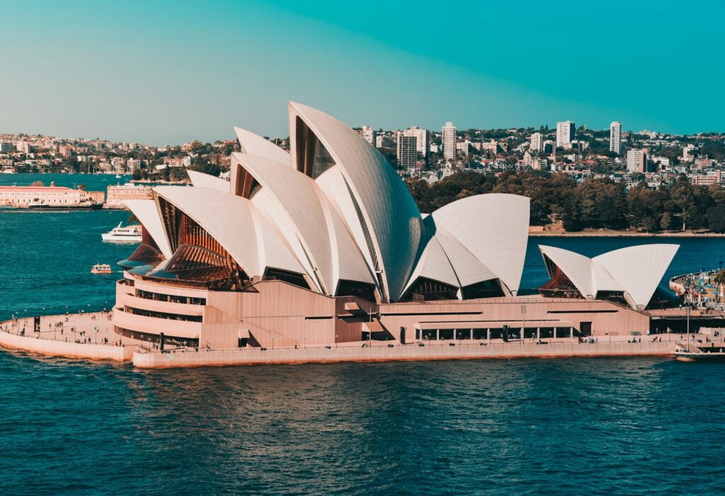 sydney opera house near body of water during daytime