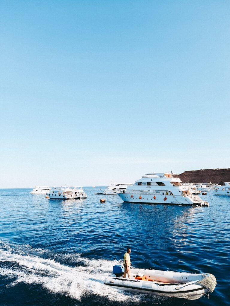 a person on a boat in the water- beach weather in Sharm El Sheikh