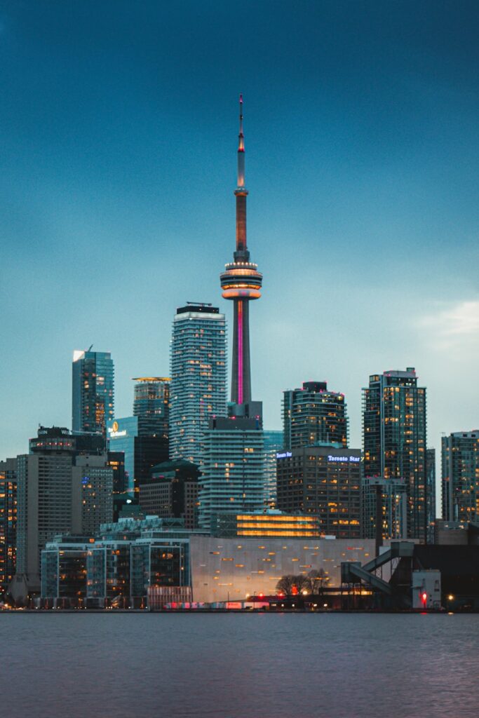 high rise buildings during night time - things to do in Toronto at night