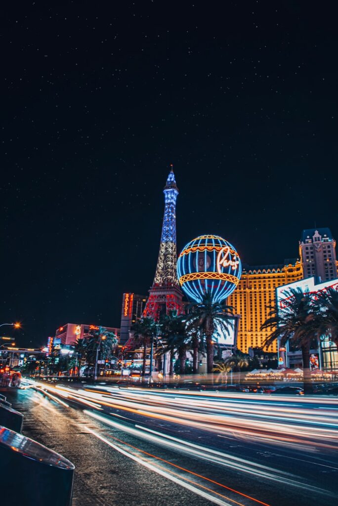 the las vegas strip at night with the eiffel tower in the background: Romantic Things to Do in Las Vegas for Couples