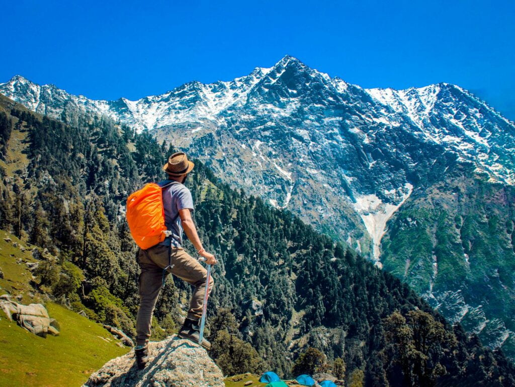 Hikers on the Jomolhari Trek with snow-capped mountains in the background.