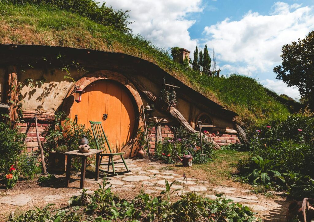 Brown and Orange House With Outdoor Plants in New Zealand